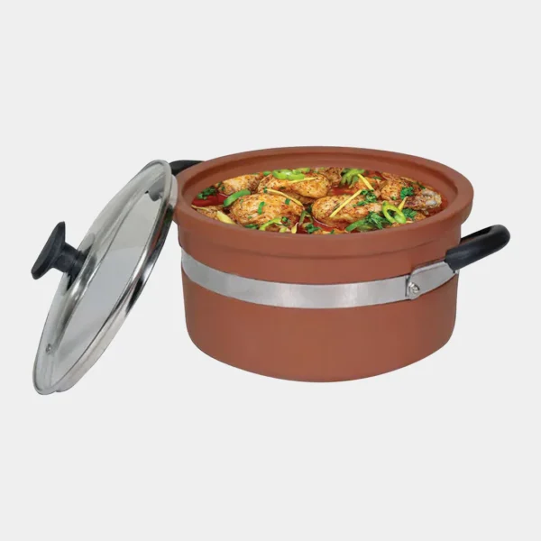 Non-glazed clay handi cooking food