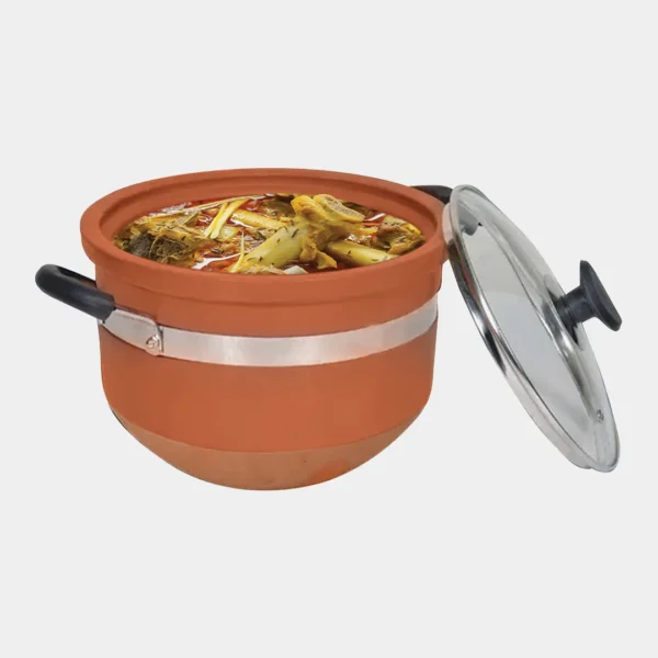 Glazed clay handi cooking food