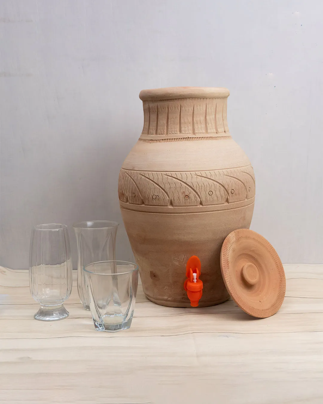 Clay Cooler 10L – Eco-friendly earthen water pot with tap and lid for natural cooling.