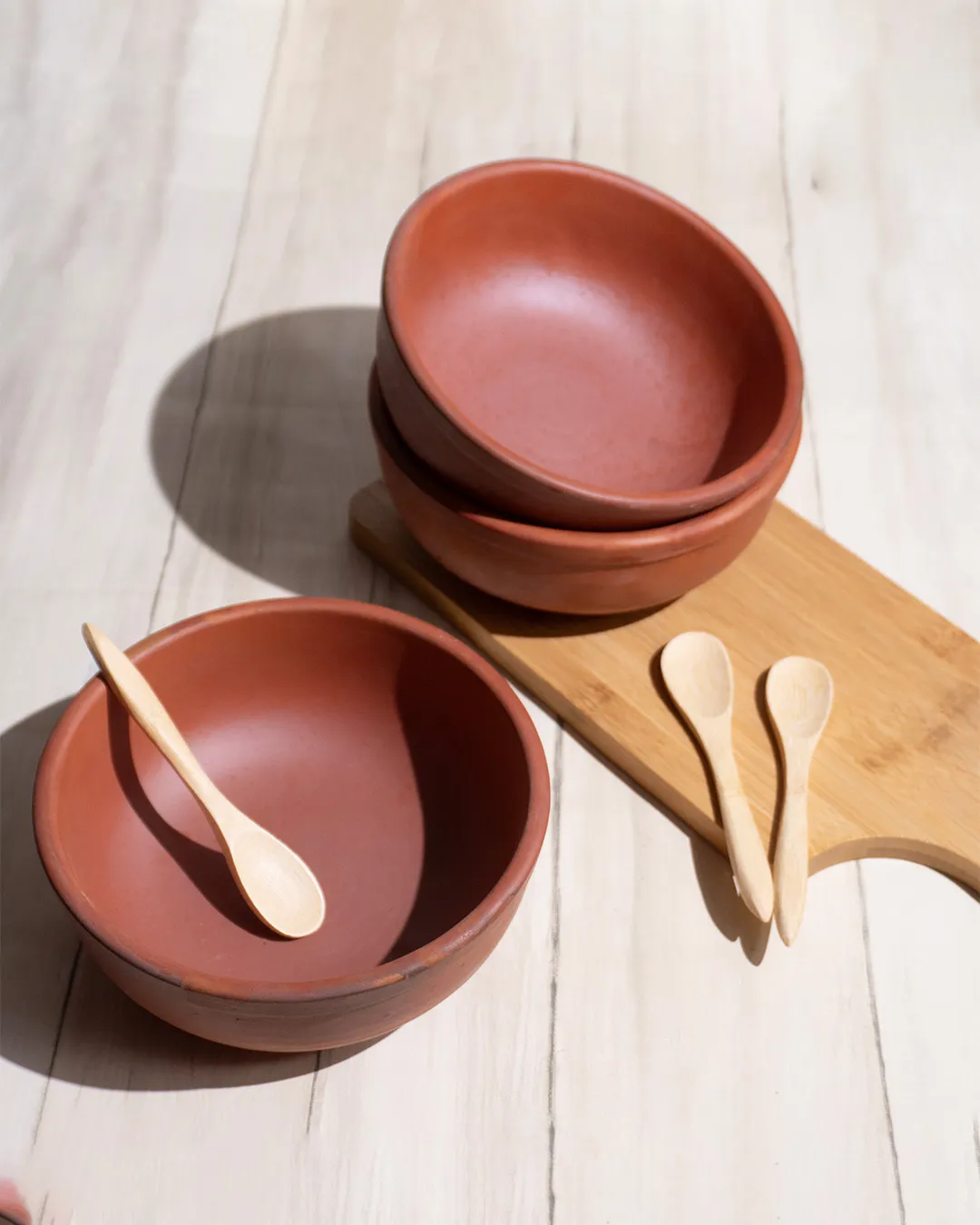 Handcrafted Clay Bowls (3 Pieces) made from natural terracotta for serving food.